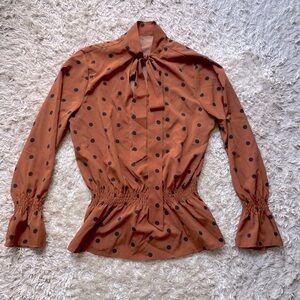 Polka dot peplum blouse